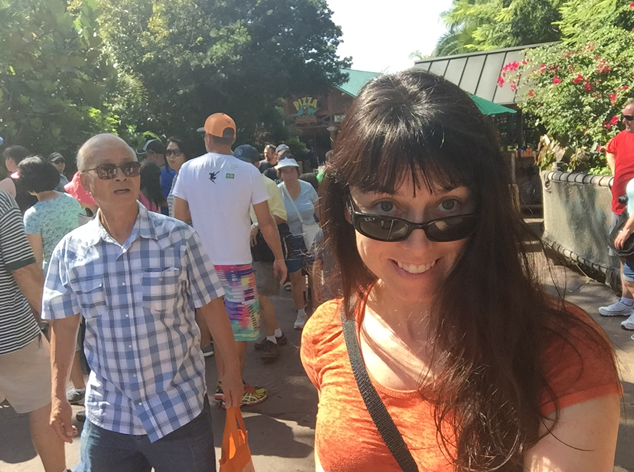 Why yes, that is a selfie stick I am holding as I walk through Jurassic Park. 